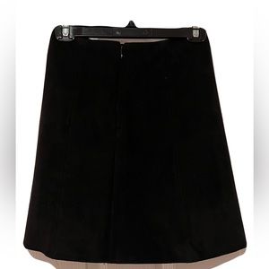 Black, suede mini skirt. Zipper on back. Aritzia
